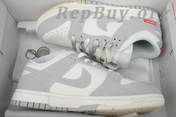 Top Version Nike Dunk Low x Supreme White Corduroy, best replica Nike Dunk Low, high quality rep sneakers, 1:1 copy Supreme Dunks, perfect replica shoes, FC1688-143 exact copy, premium fake sneakers, luxury replica footwear, flawless Supreme x Nike reps